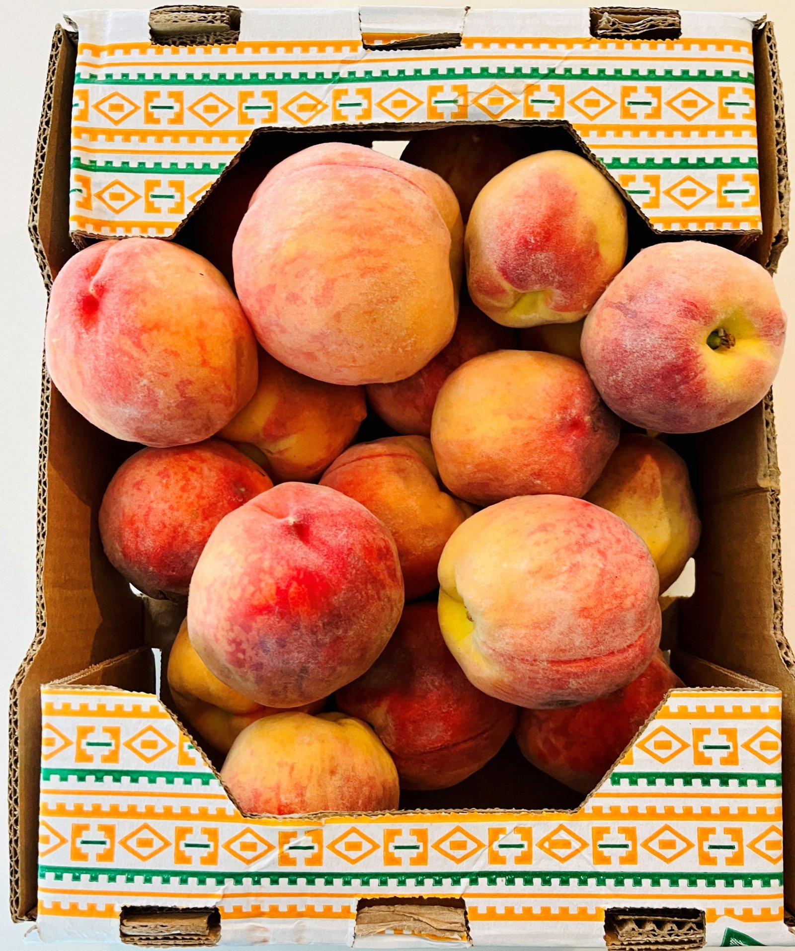  fresh peaches in a box for reduced sugar peach jam preserve recipe

