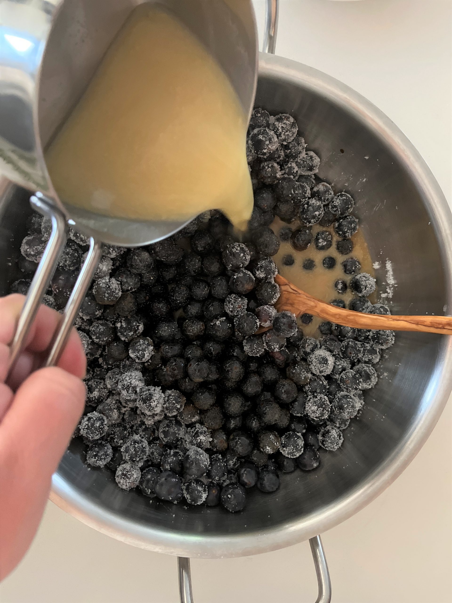 Concord Grapes Jam Recipe: Add sugar and the mustard-wine mix to the pot with grapes