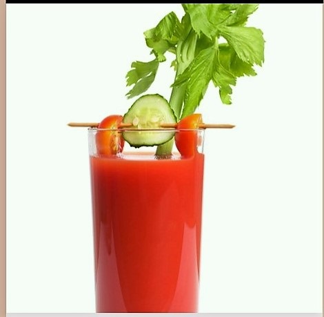 a glass of cold tomato juice with vegetables - art