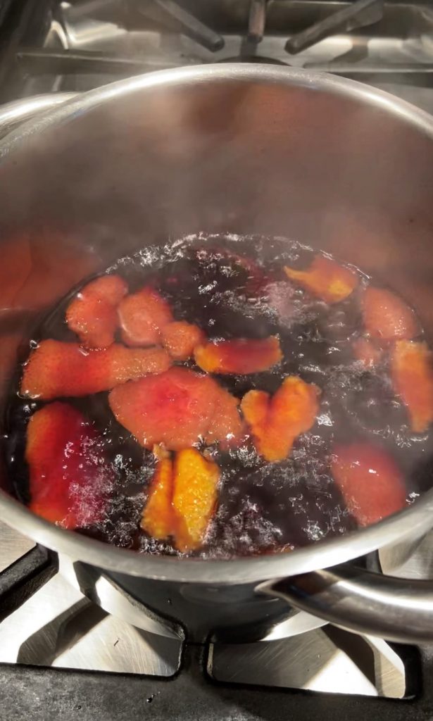 cook the wine jelly mixture for 5 more minutes after you added pectin, sugar and spices