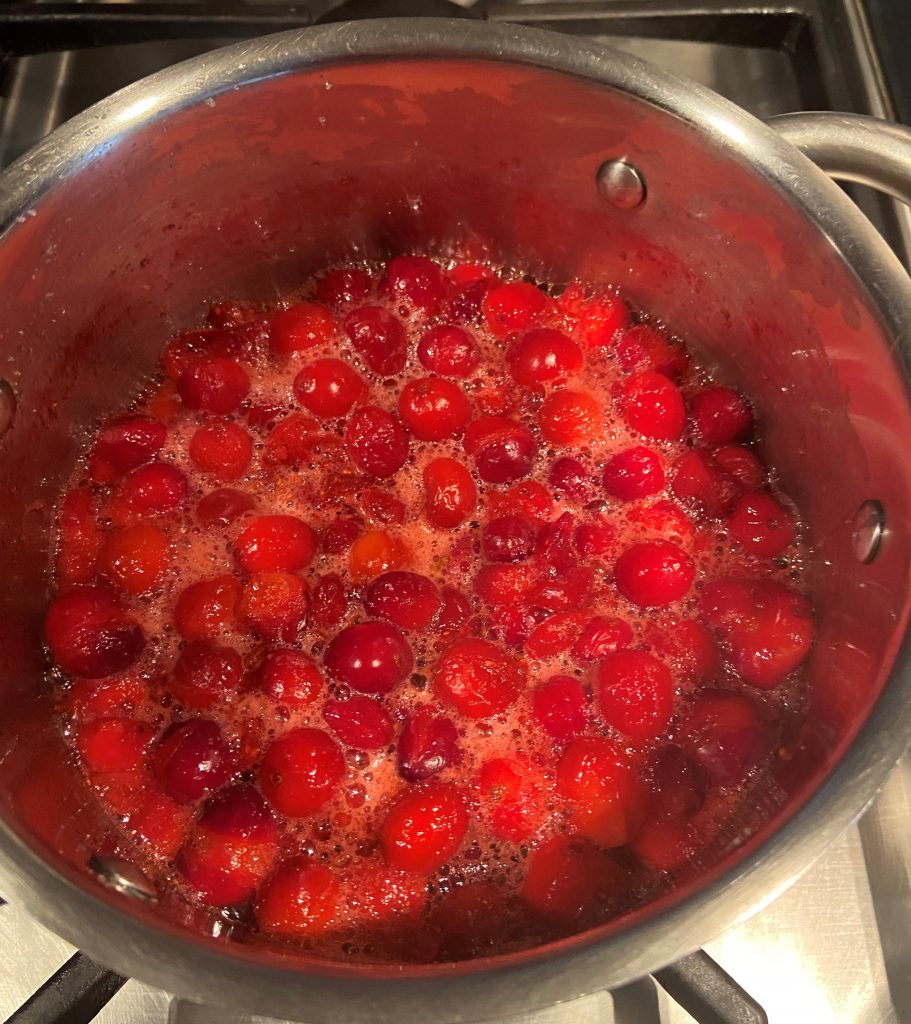 bring to boil a mixture of cranberries, sugar and water