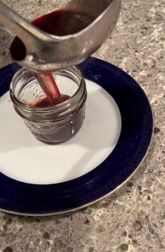 pour piping hot jelly mixture into prepared jars