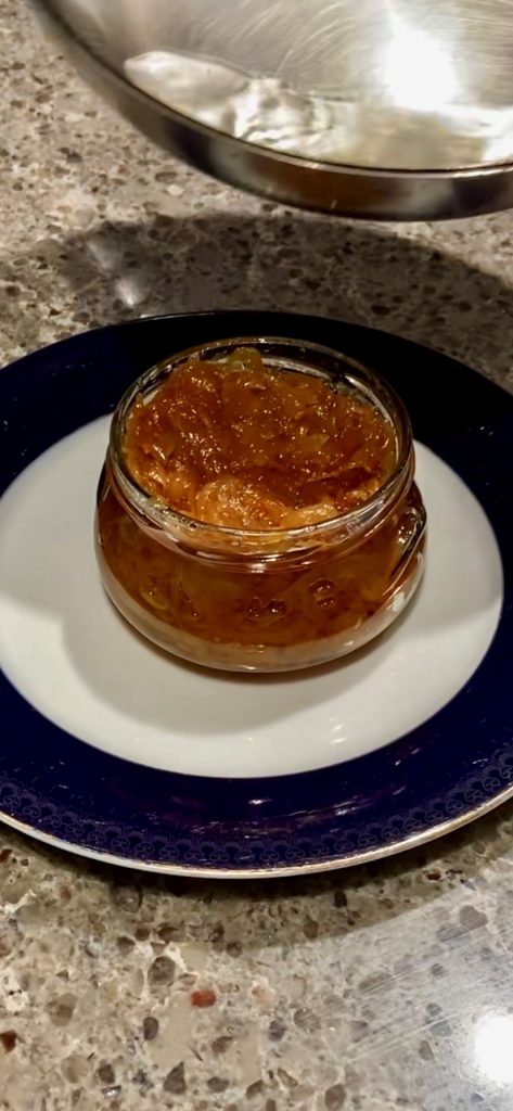 pack caramelized onions into clean sterilized jar and film with hot oil