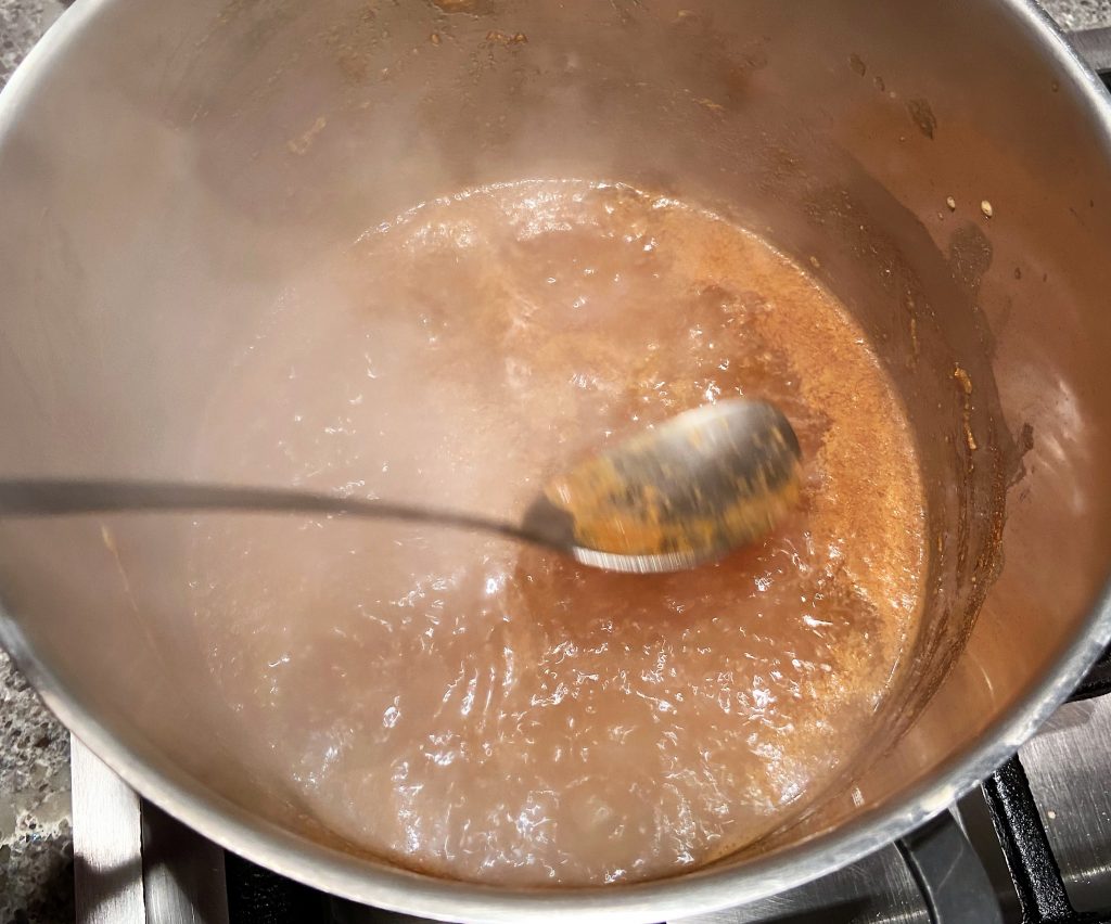 remove remaining foam from the boiling  juice 