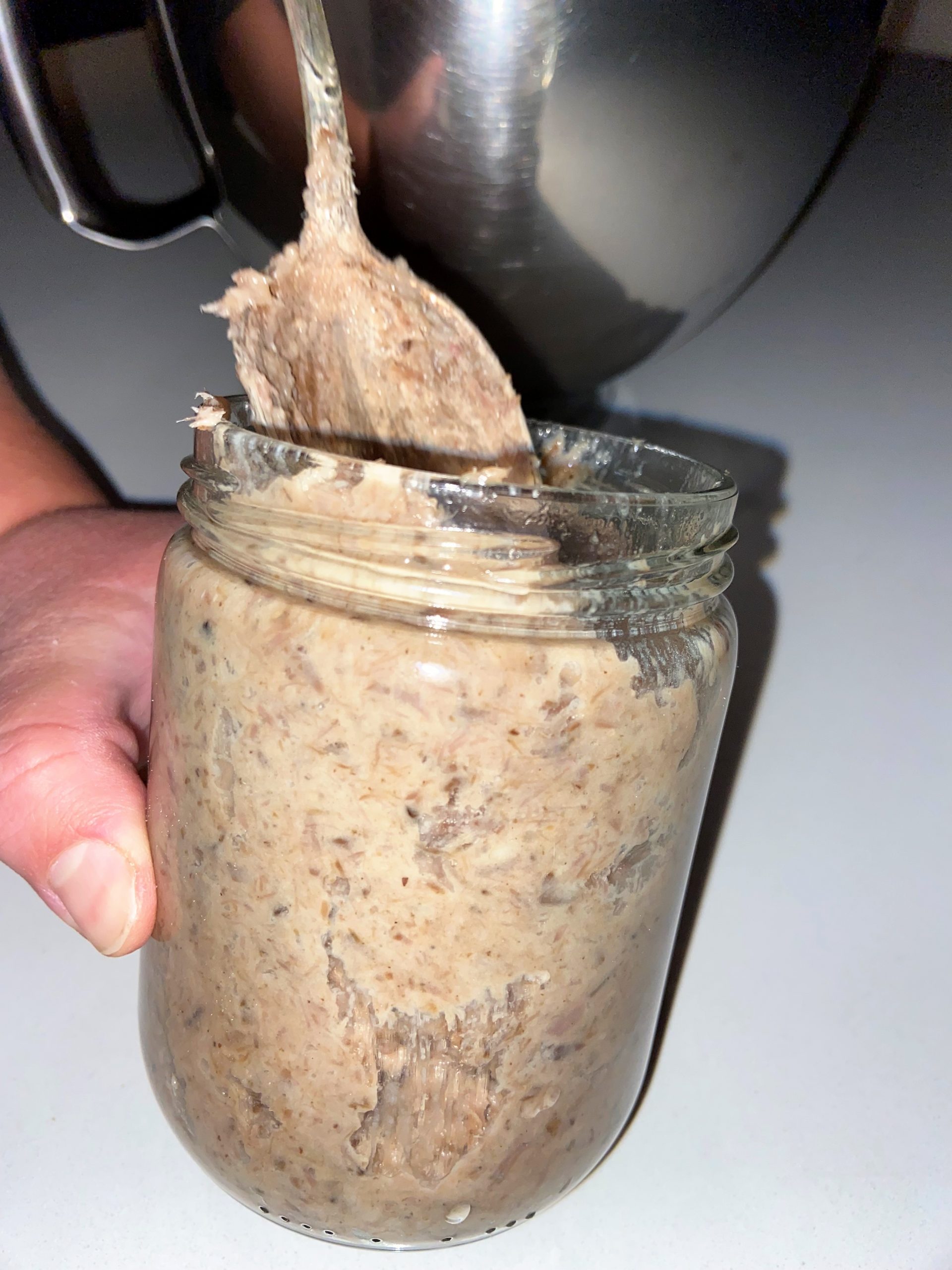 packing rillettes into a jar