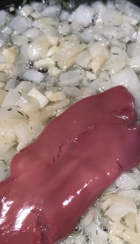 add duck liver to the onion-garlic mixture