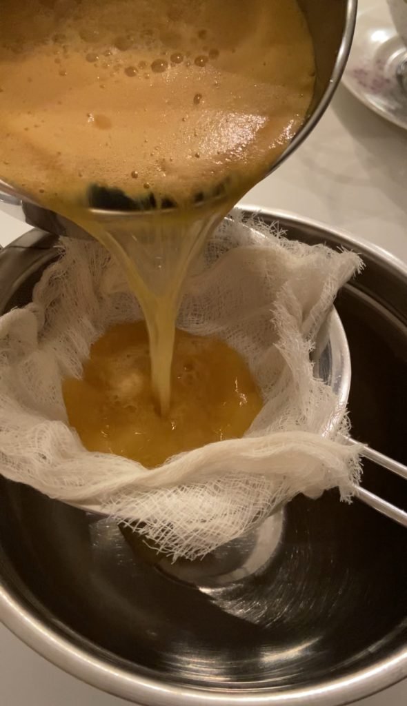 use cheesecloth to remove sediment from the freshly pressed juice