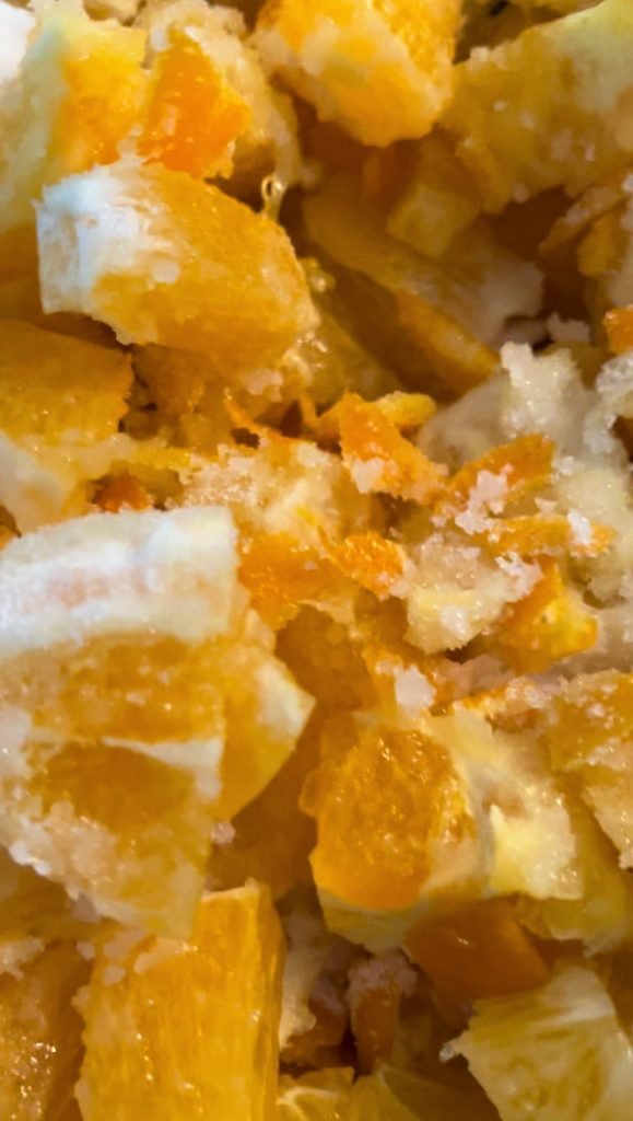 mix chopped lemons, oranges, zest with sugar and water