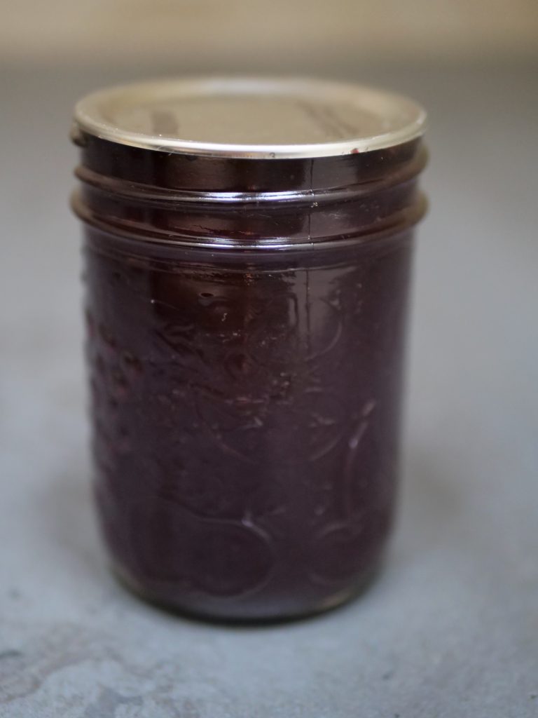 Canned Boozy Concord Grape jelly is ready to be enjoyed