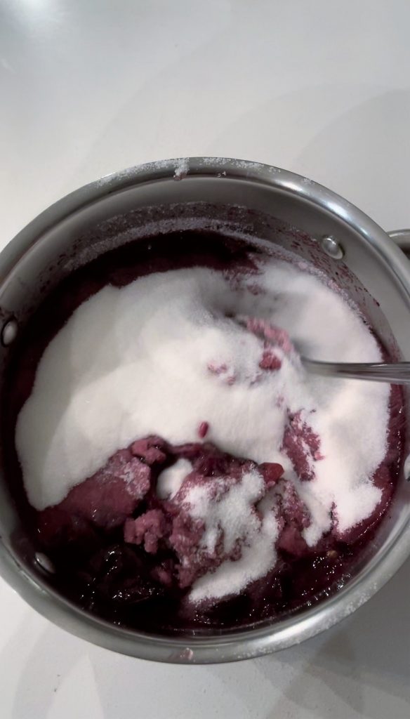Mix crushed grapes with sugar