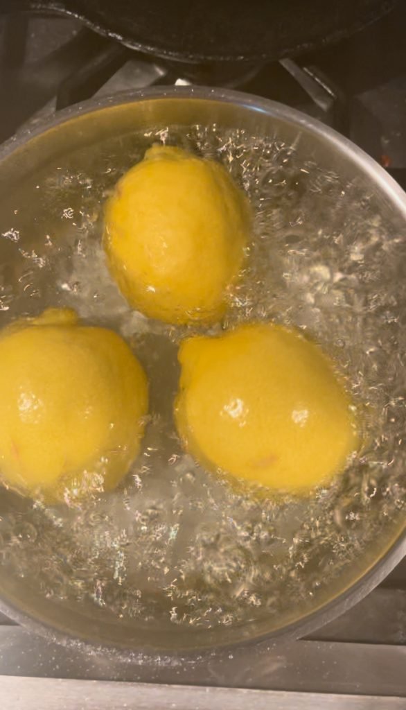 bring unpeeled lemons to boil