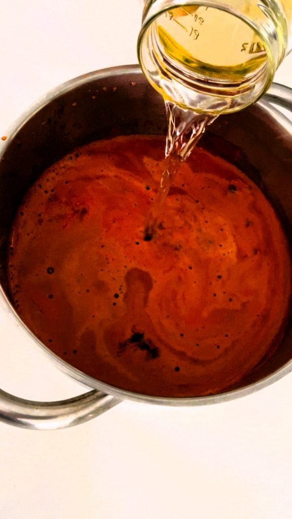 we use apple cider vinegar in this red pepper jam canning recipe