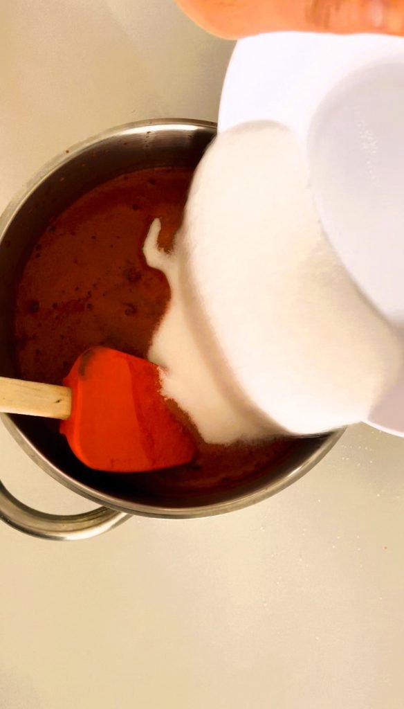 add sugar to the red pepper jam mixture