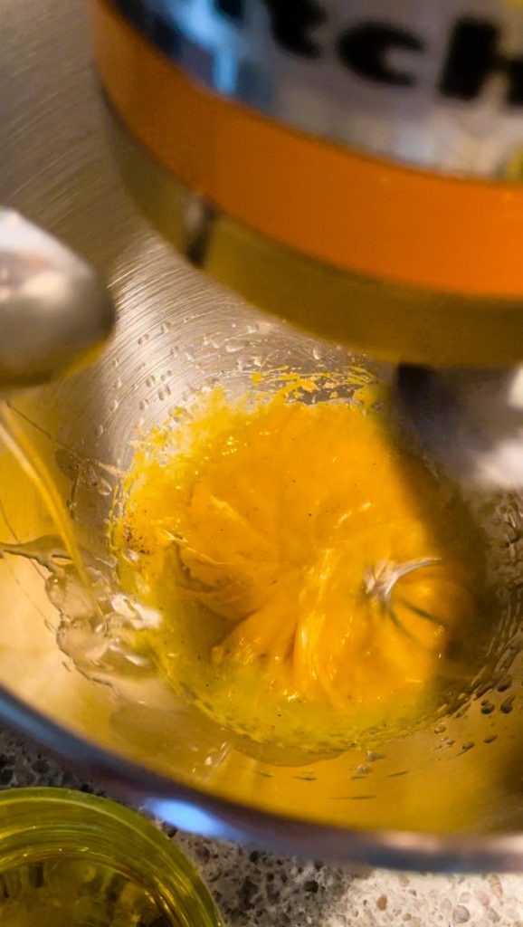 start by slowly adding oil to egg yolks