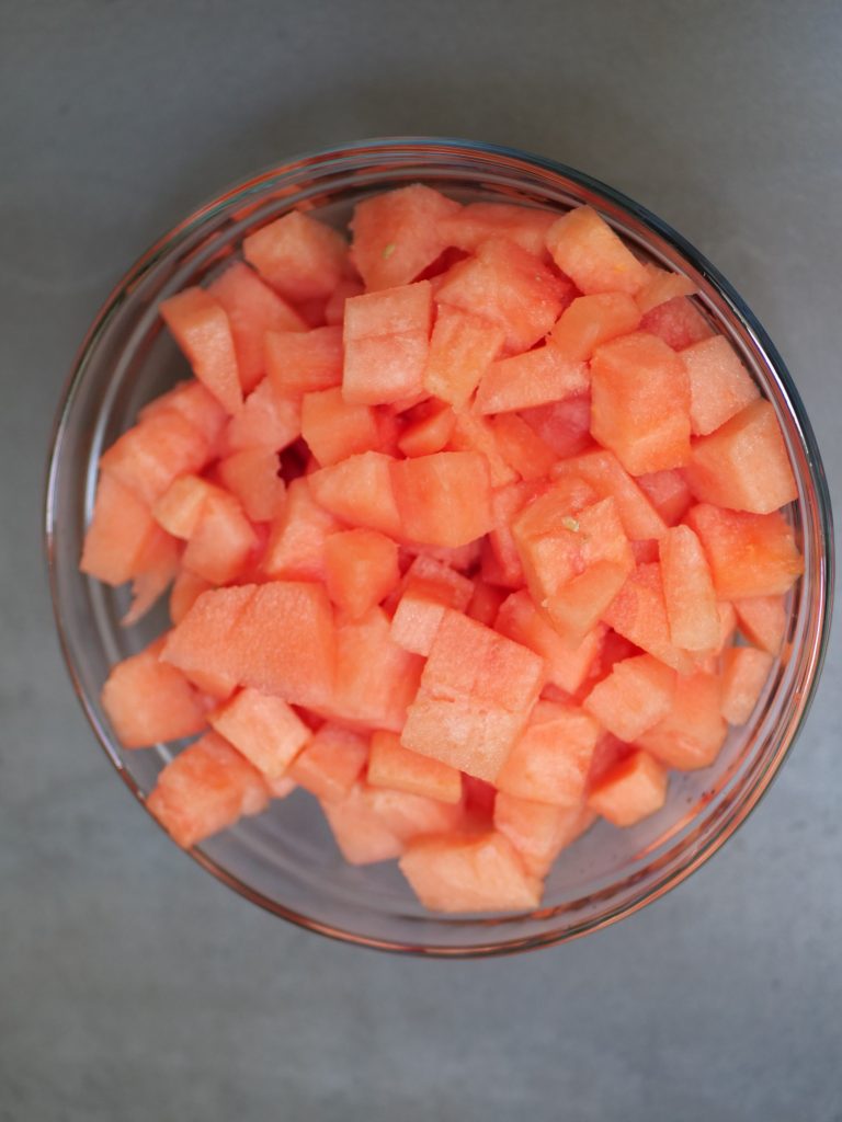 remove the rind and cube watermelon 