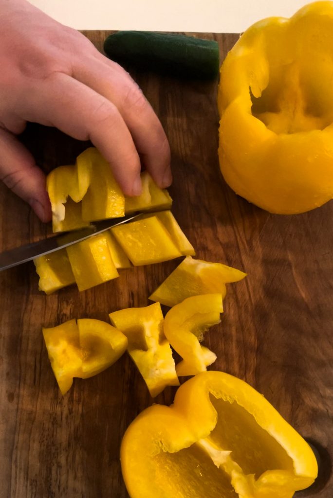 Begin by dicing bell peppers and jalapeno