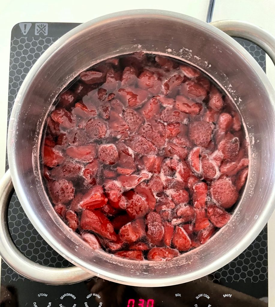bring strawberries and their juices to a boil