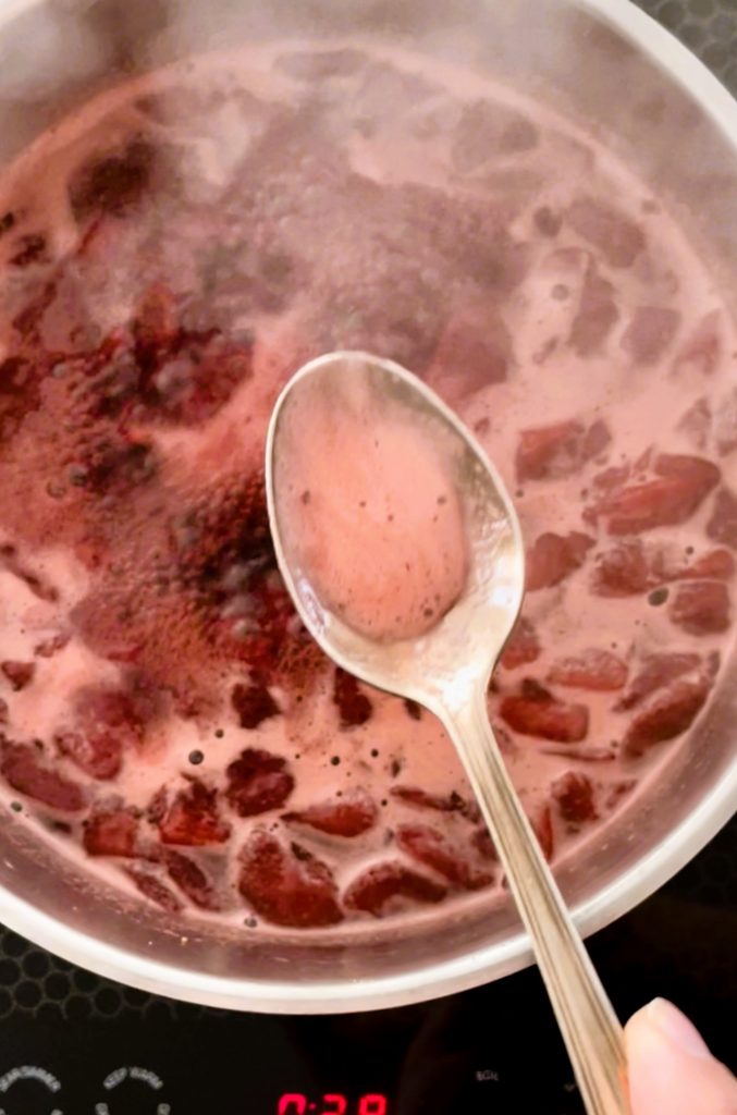 skim impurities to make quality strawberry syrup