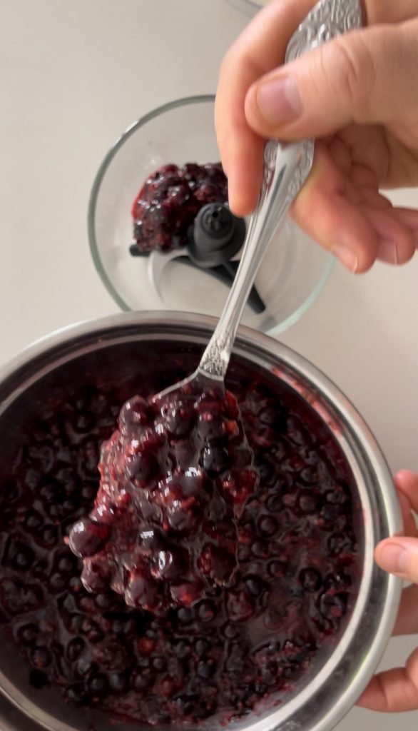 crushed macerated blackcurrants and their rendered juices