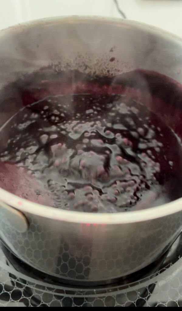 bring rendered berry juices to a quick boil before adding pectin sugar mixture