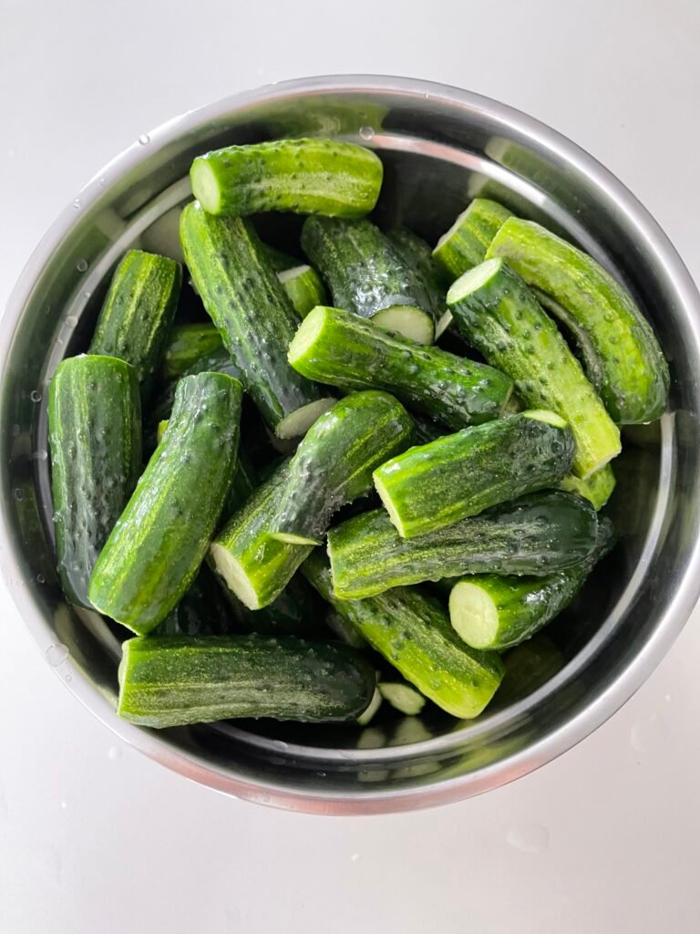 cucumbers with their tail ends trimmed 