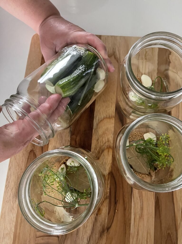 cucumbers tightly packed into Mason jar