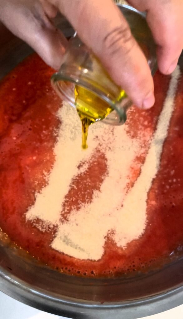 add spices to crushed tomatoes