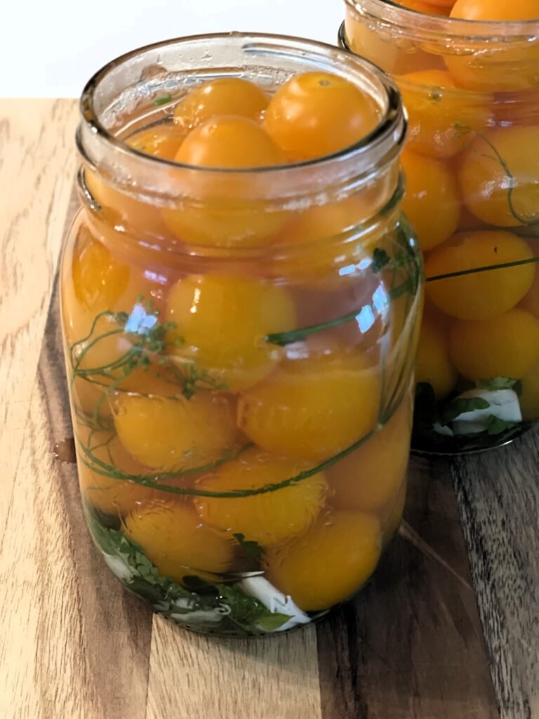 we let tomatoes sit in freshly boiled water before canning