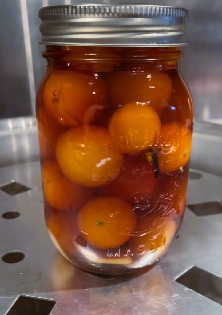 Enjoy the new pickle flavor. Canned cherry tomatoes can go into the pantry after the they rest