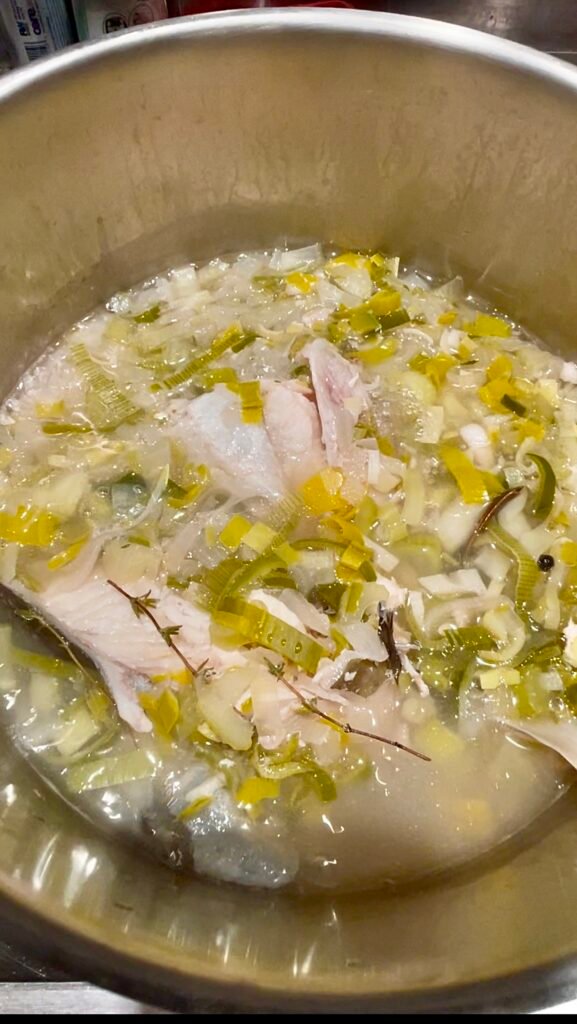 fish stock with all impurities foam removed 