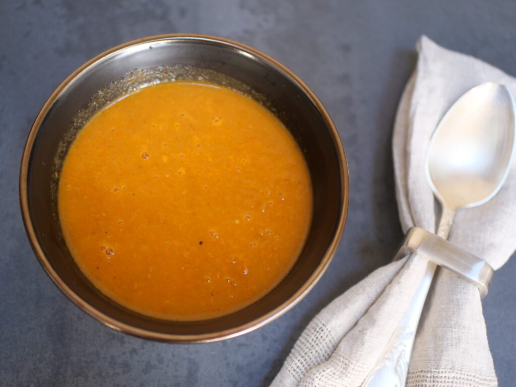 creamy roasted tomato soup in a bowl  ready to be enjoyed