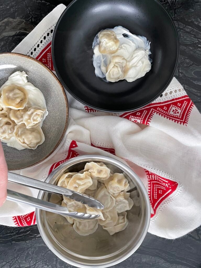 our favorite way to serve pelmeni is with a dollop  sour cream