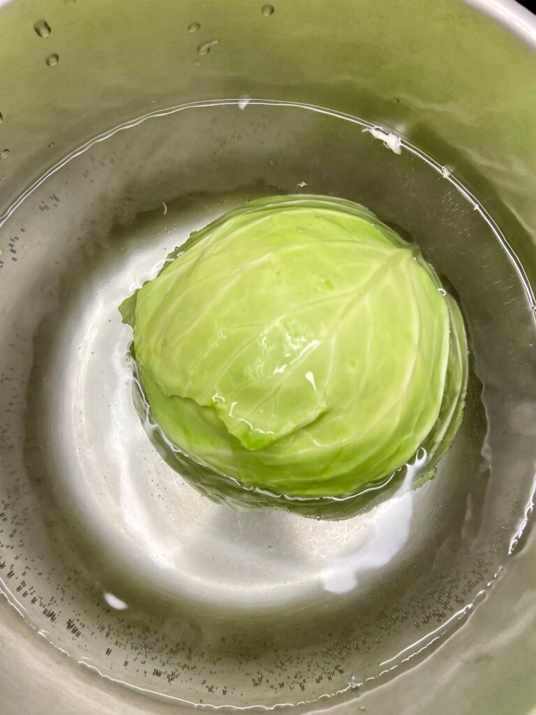 parboil cabbage in a pot of water before you start removing leaves