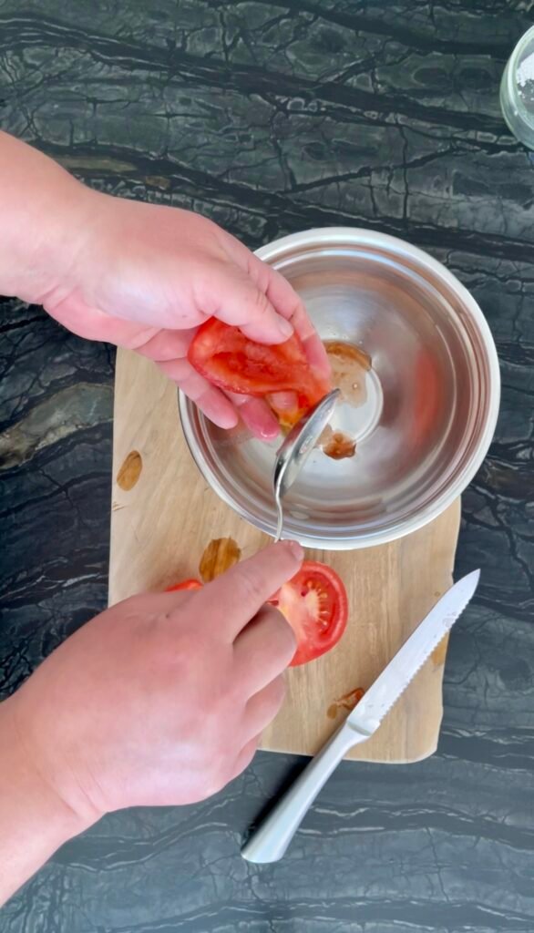 de-seed and remove as much juice from tomatoes