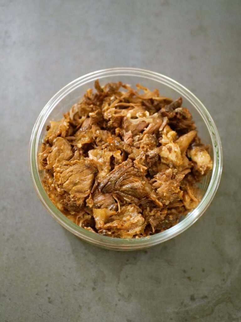 shred fully cooked oxtails meat