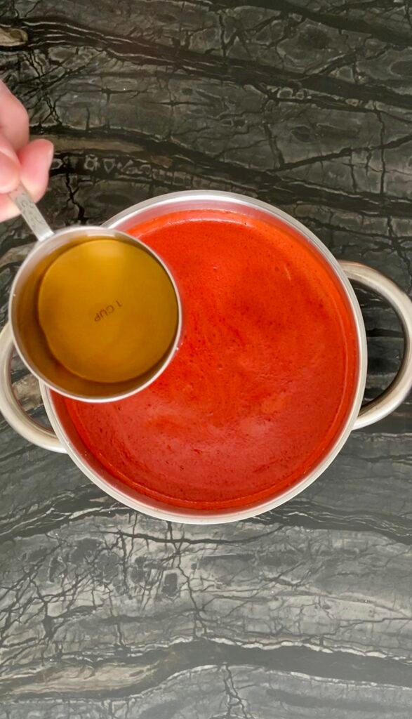 add vinegar to the red pepper jam mixture