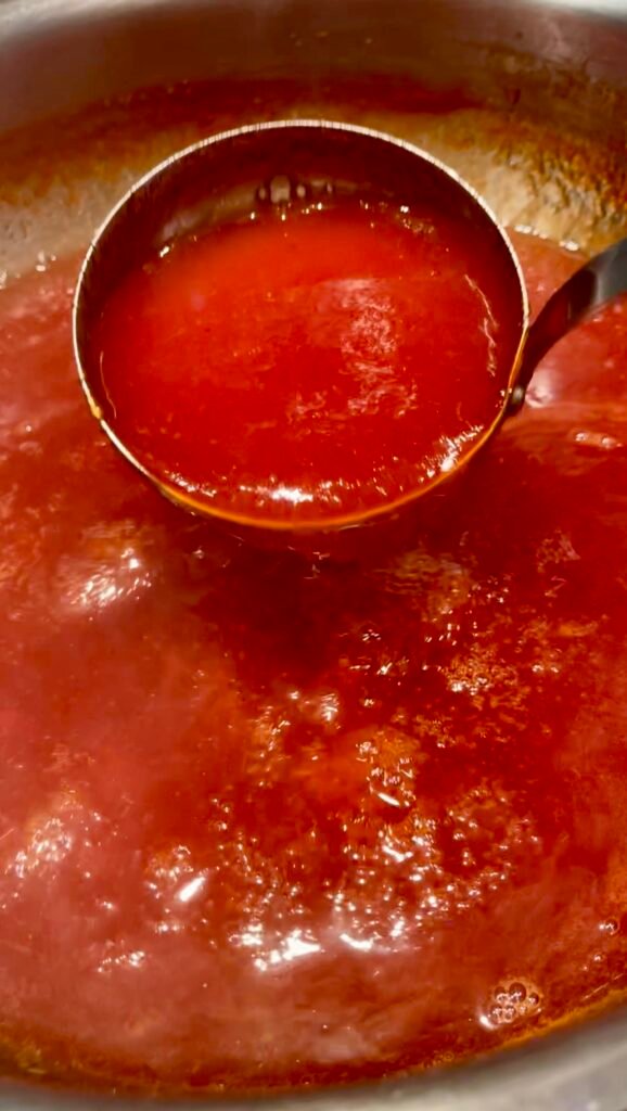 jam mixture will reduce and become syrupy when it's ready