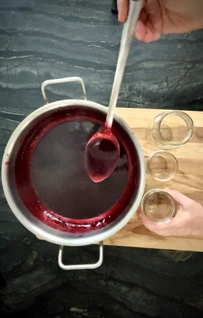 pour finished seedless jam recipe into the canning jar