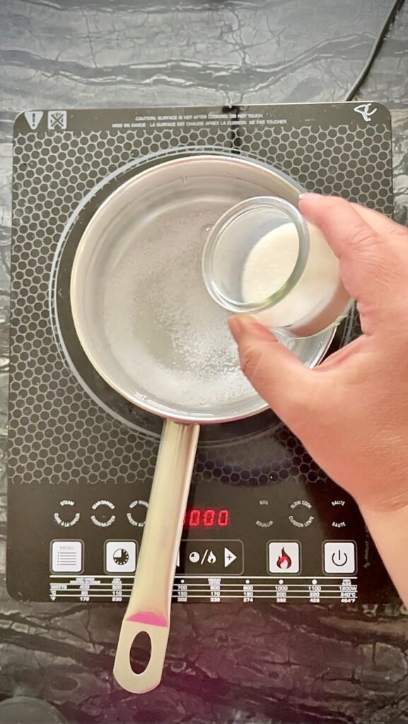 sugar gets added to the pot with salt and water