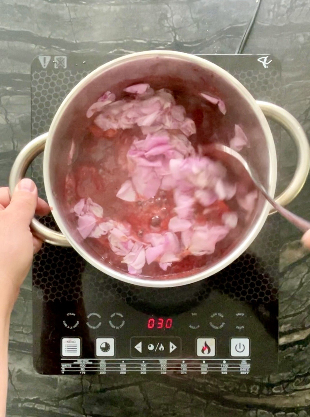 stir to combine rose petals with the jam mixture