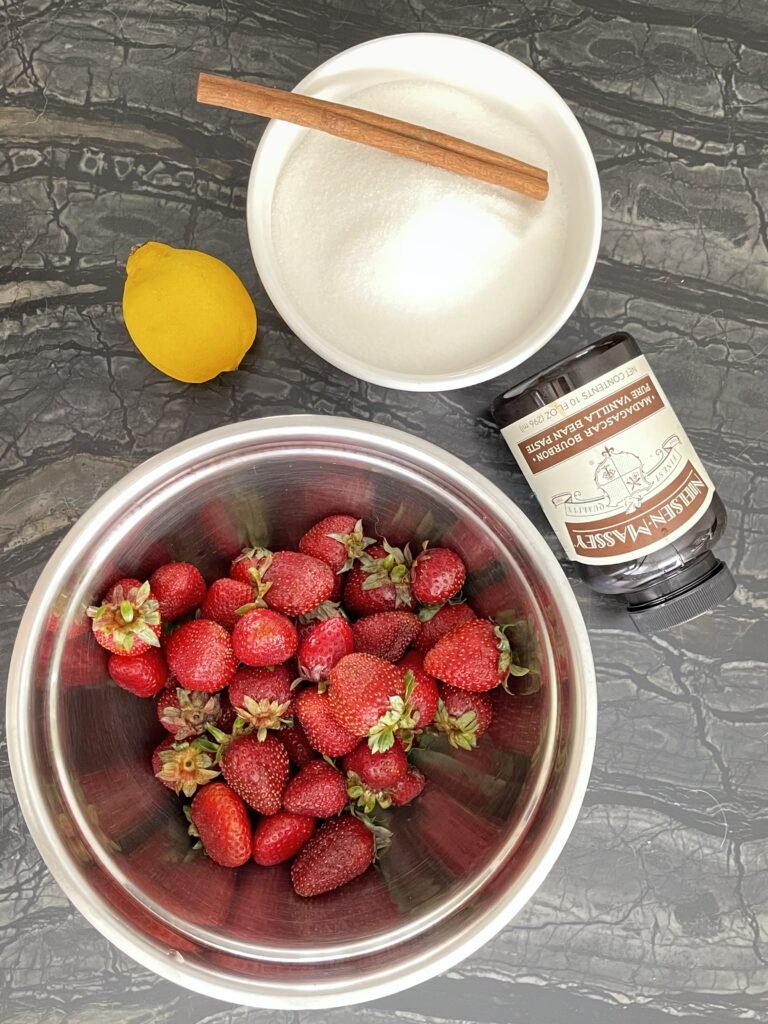 strawberry sauce recipe ingredients laid out on the table