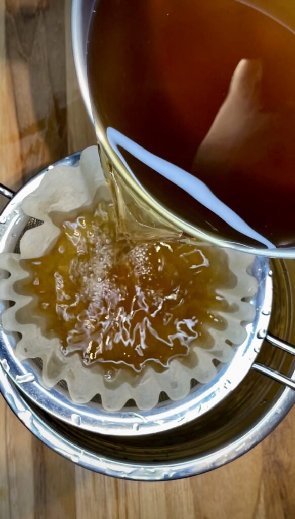 coffee filter and a fine metal strainer are our tools to filter grits from the porcini soaking water