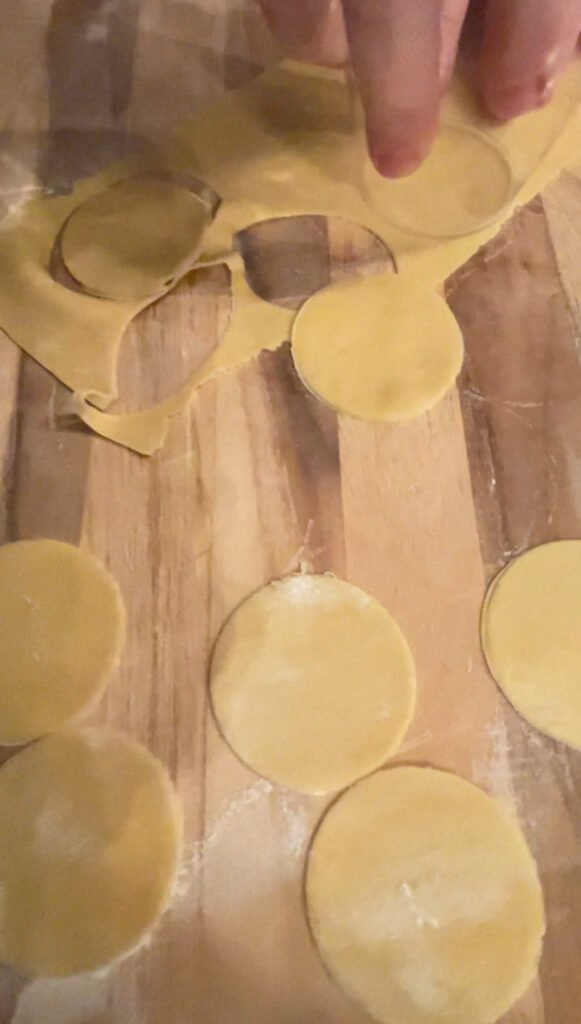 make pasta dough rounds with a glass