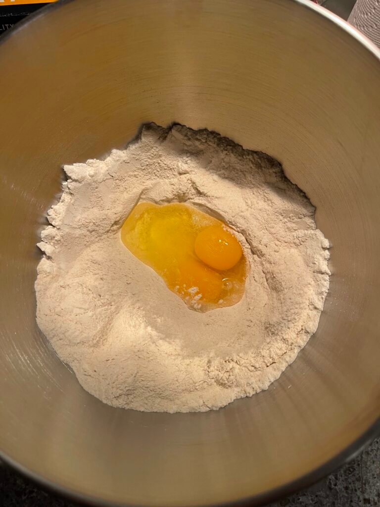 make a well and adding the eggs