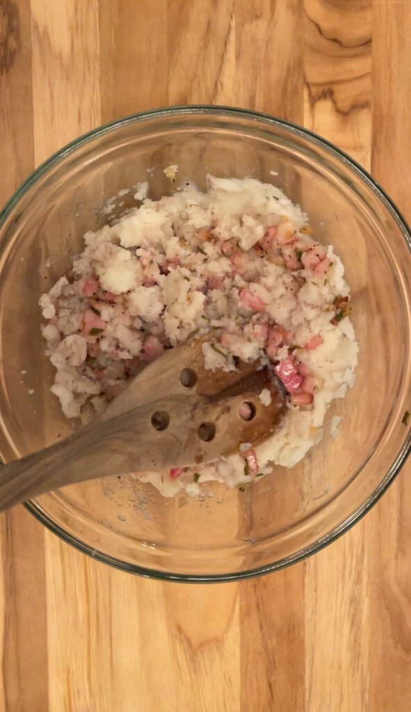 mashed potatoes gets combined with fried  pancetta