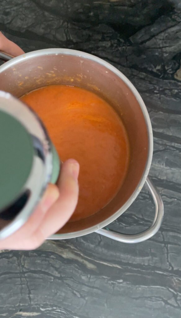 we use hand-held blender to get creamy roasted red pepper and tomato soup