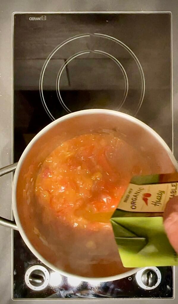 We follow by adding vegetable stock