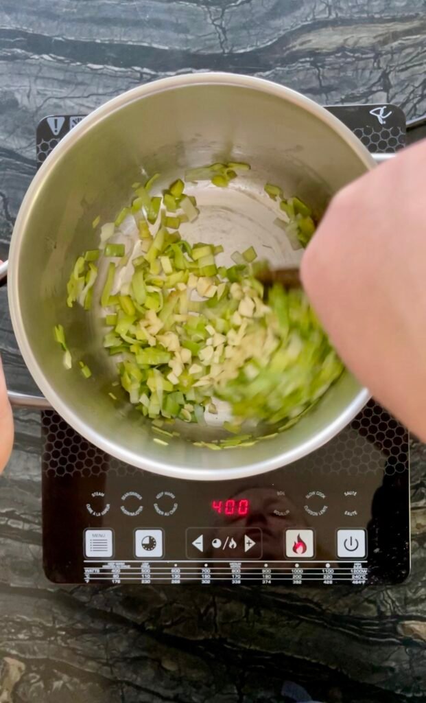 quick cook of a garlic -just to let it release its flavor