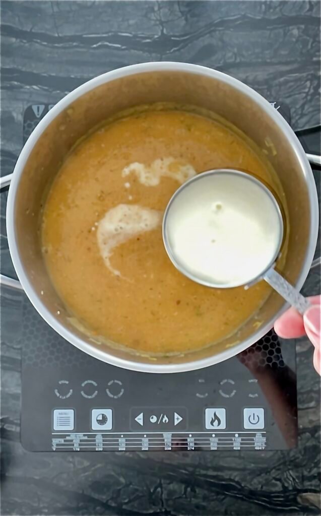 we add a cup of milk to the blended soup