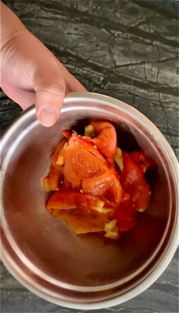 red peppers peeled and segmented ready to be used in our red pepper soup